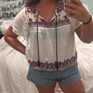 White spanish style embroidered flowy blouse